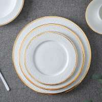 Best selling white ceramic charger dish plate, wholesale fine bone china embossment wedding dinner plate set with gold rim